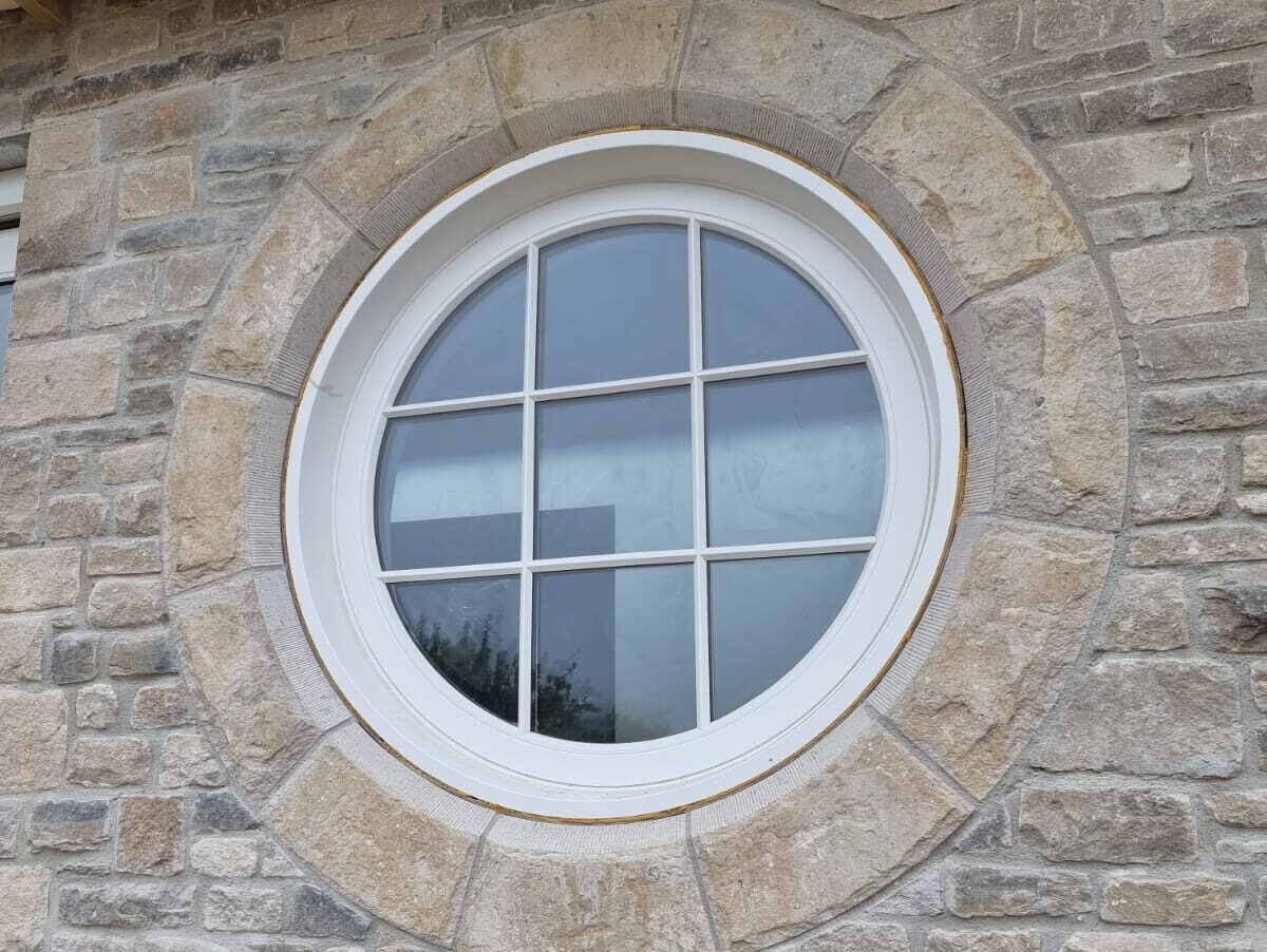 Round timber casement window by Kings Stag Joinery